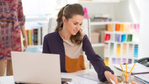 woman working at desk on branding